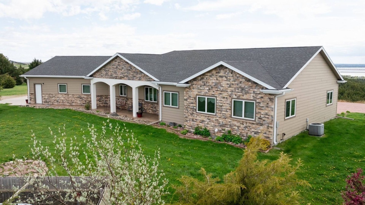 Chamberlain House | Location Location Location! On a river view acreage, sleeps up to 14, pets ok.