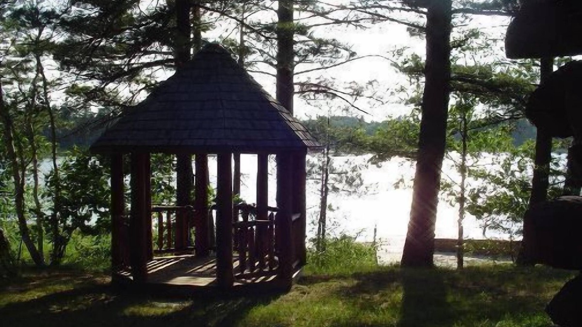 Gaylord House | Log Home On Wequas Lake, snowmobile trails & parking, near skiing, dog-friendly