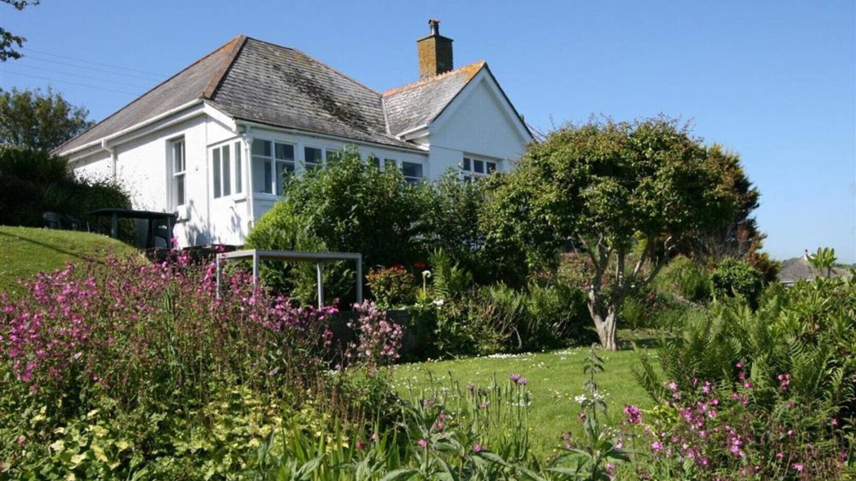 Portmellon Cottage | Longships, looks across the cove of Portmellon