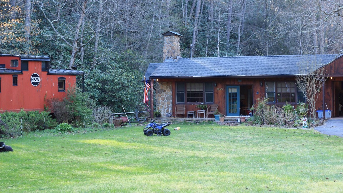 Rye Valley House | Lovely cottage by stream with caboose and covered bridge over trout stream