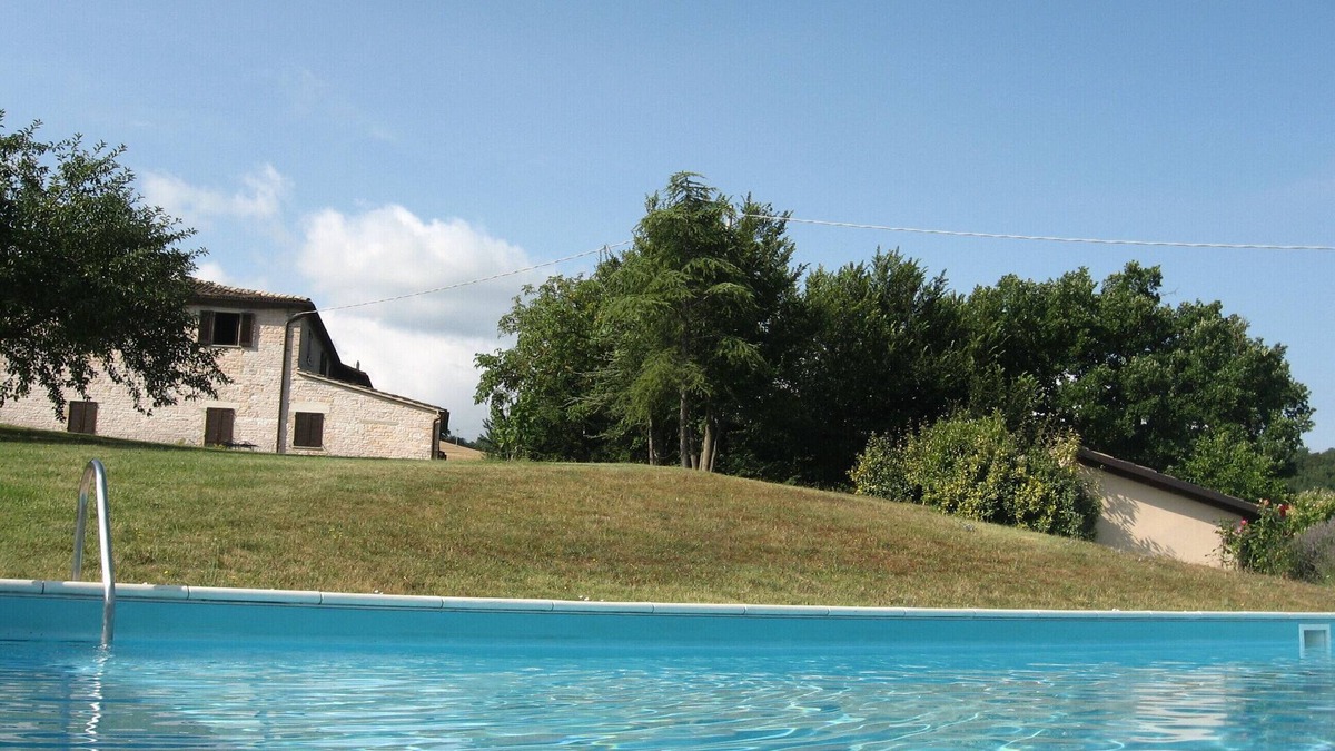 Cagli Apartment | lovely panorama, pool and valley view, equipped with kitchenette.