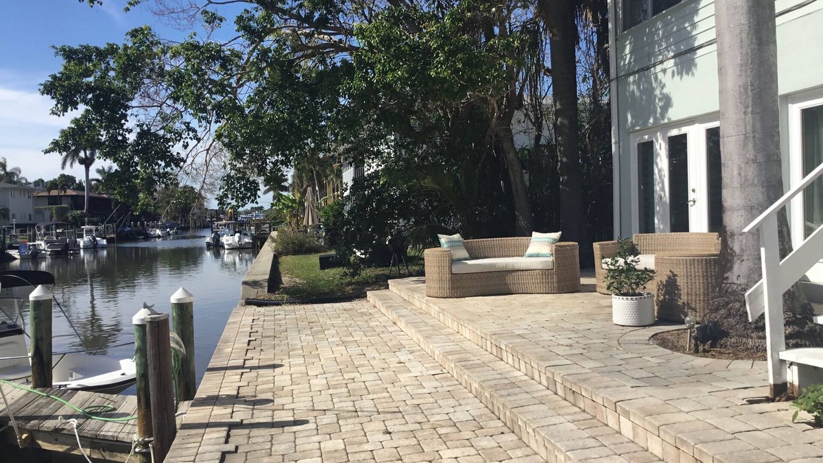 Royal Harbor Condo | Lovely Two bedroom/Two bath Main Floor on the canal to Naples Bay! Pet friendly
