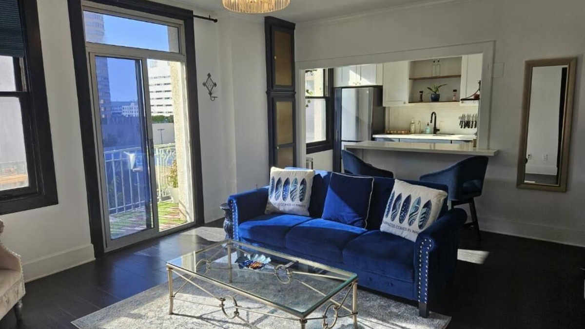 Downtown Long Beach Condo | Luxe Suite one bedroom with free parking, balcony and partial ocean view.