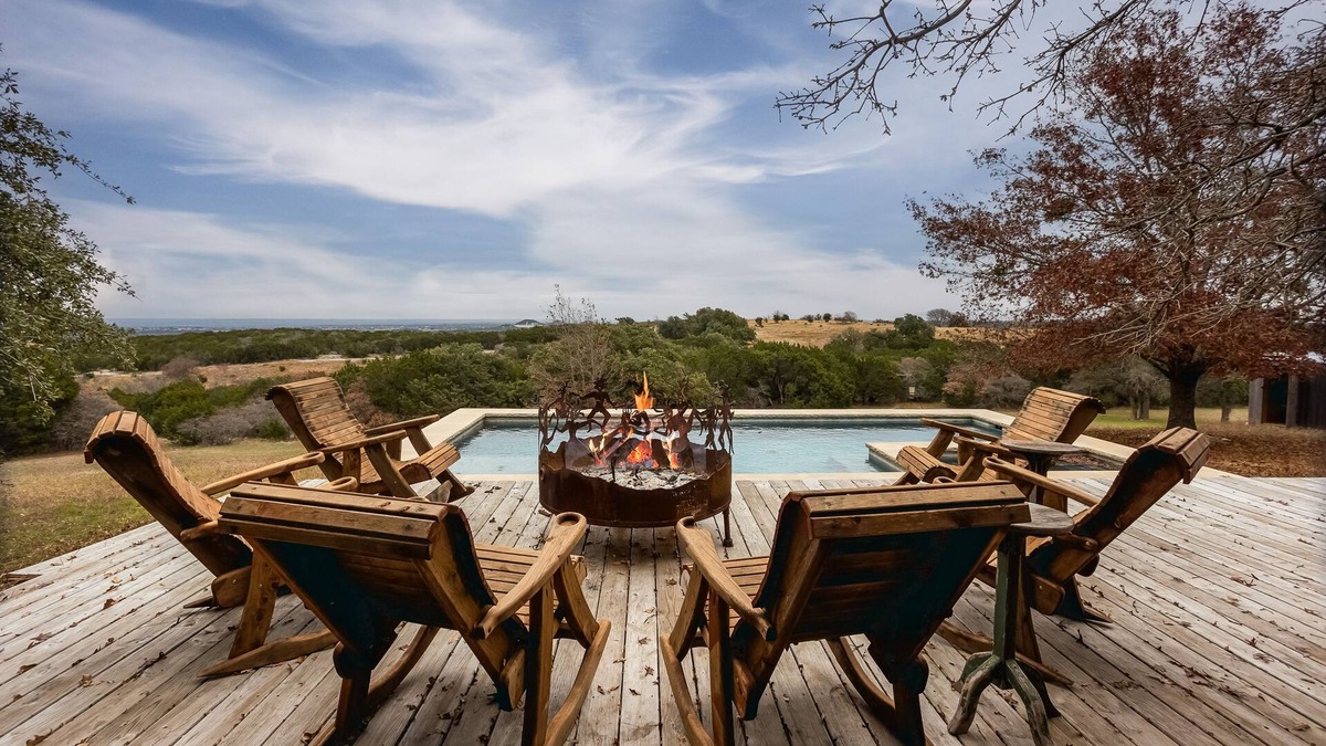 Glen Rose House | Luxurious property with pool, hot tub, wraparound porch, & two primary suites