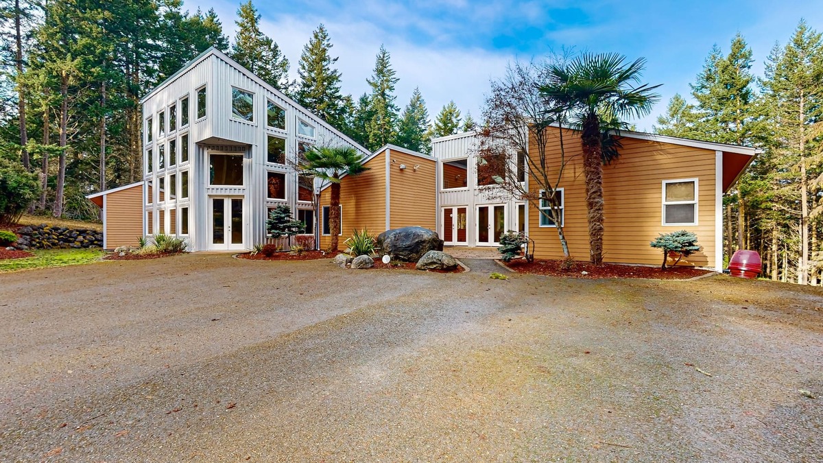 Sequim House | Luxurious tropical home with private hot tub atrium, theater & pond