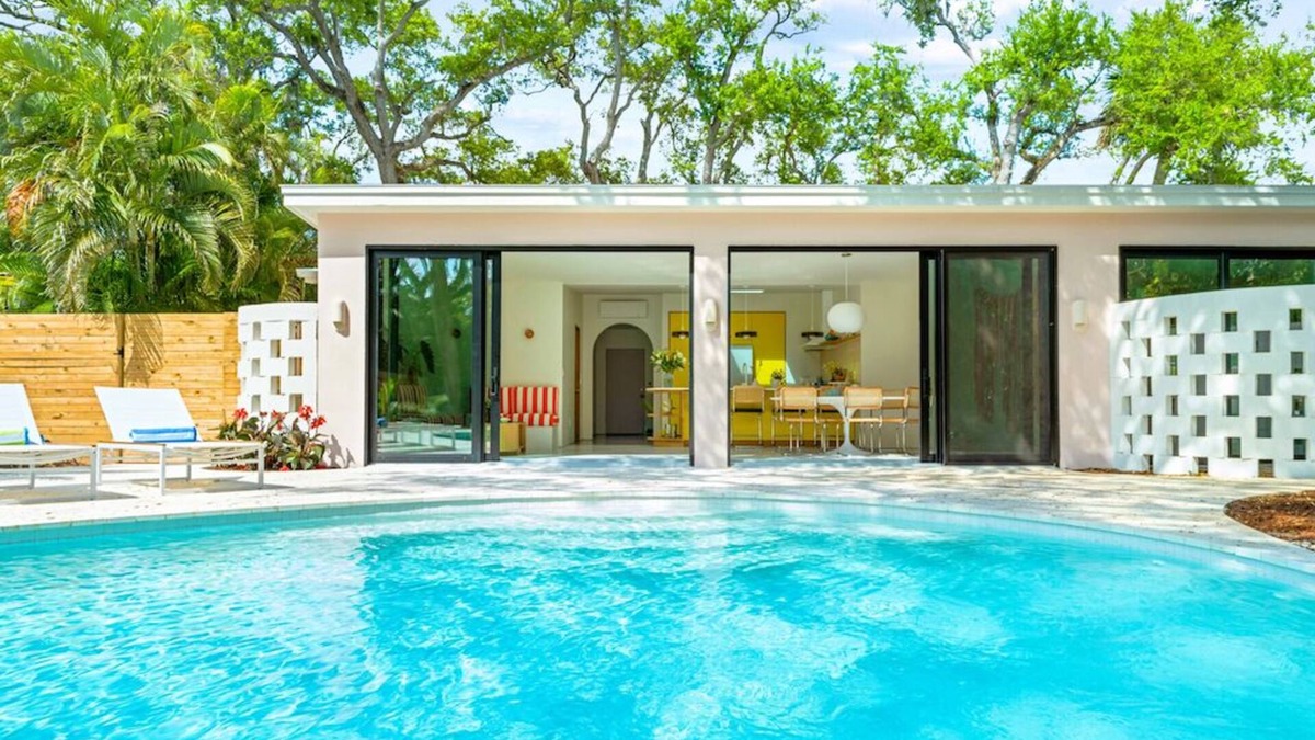 Central Beach House | Luxury 3BR, 3BA w/heated saltwater pool–10min walk to Beach, Shops, Restaurants!