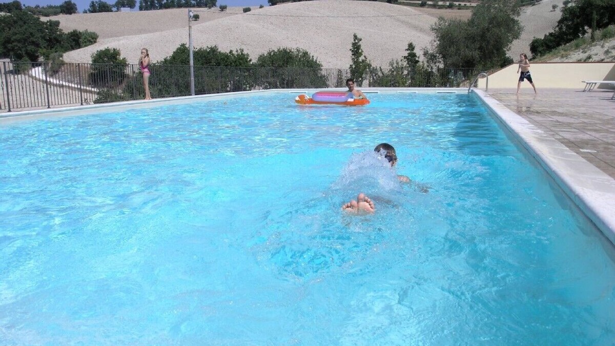 Bargni Apartment | Luxury air conditioned apartment with swimming pool and tennis court