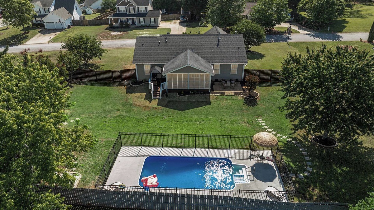 Greer House | Luxury Getaway with huge, fully fenced yard, Pool & Porch in Greer SC