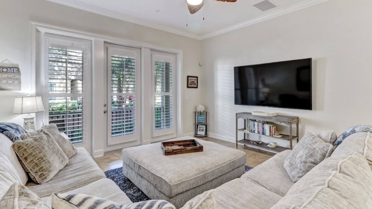 American Beach Condo | Luxury ground level condo. Golf cart, bikes, included.