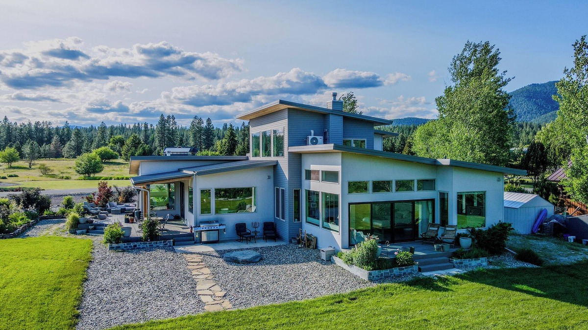 Libby House | Luxury Home on the Kootenai River with Panoramic Cabinet Mountain Views