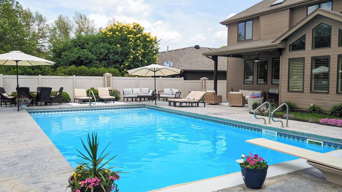 Omaha House | Luxury Home with Heated Saltwater Pool