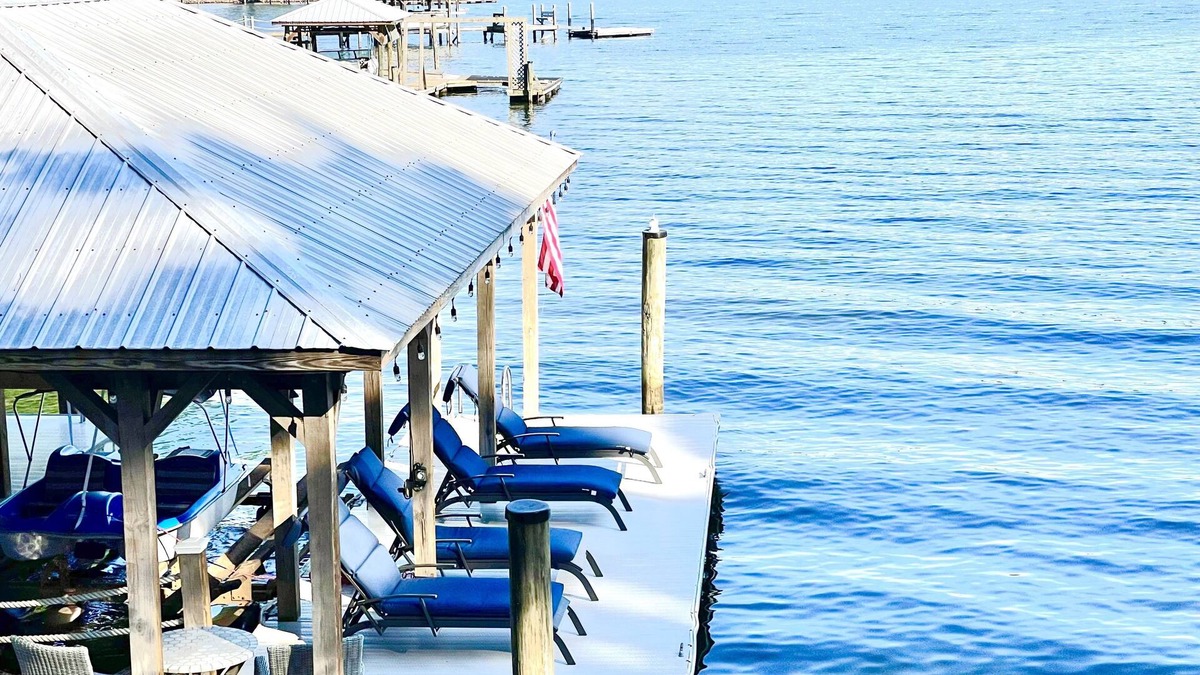 Terrell House | Luxury lakefront home with a covered private dock & large game room