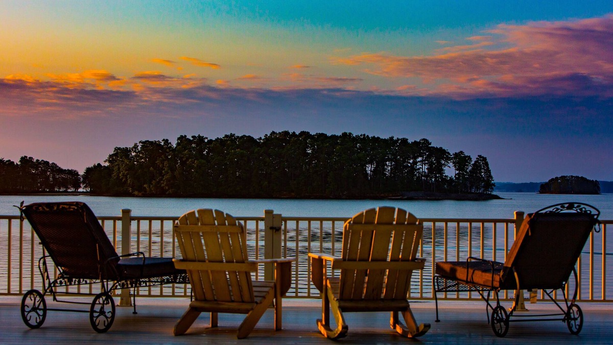 Cumming House | Luxury lake home, private sandy beach, huge covered double dock.
