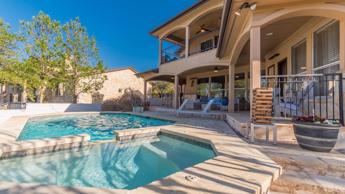 Paleface Park House | Luxury Lake Travis Waterfront River Retreat: Heated pool, yard, pool table