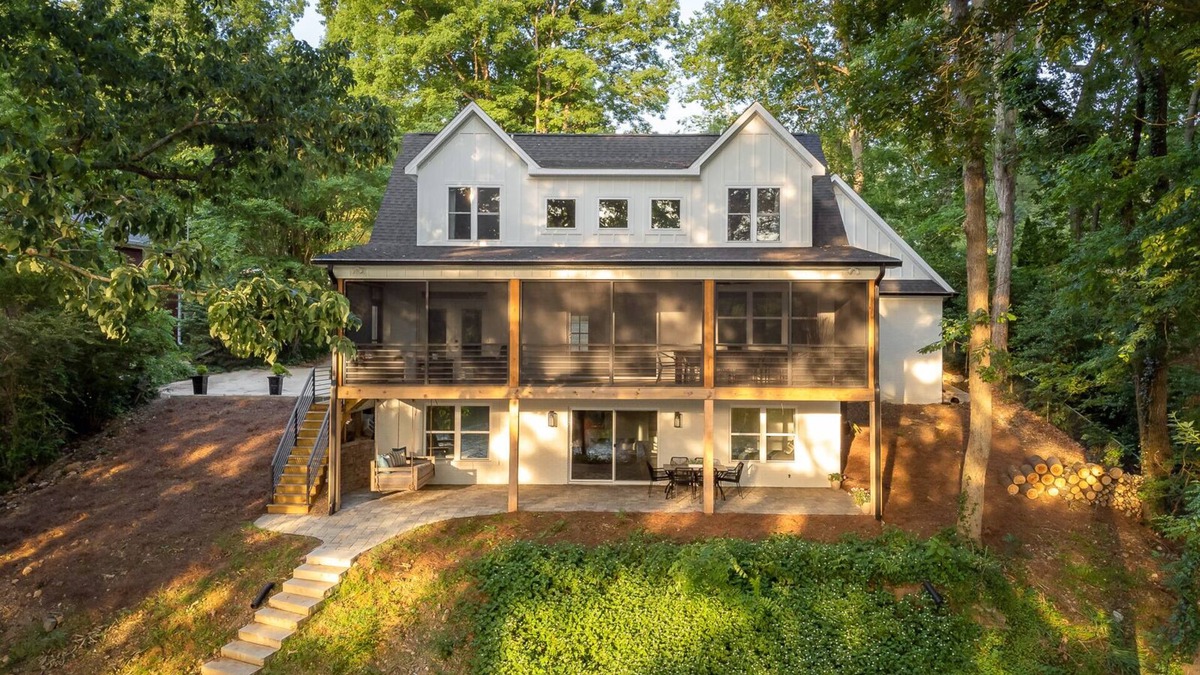Florence House | Luxury Lakefront home with gorgeous views, screened patio, firepit, & boat dock