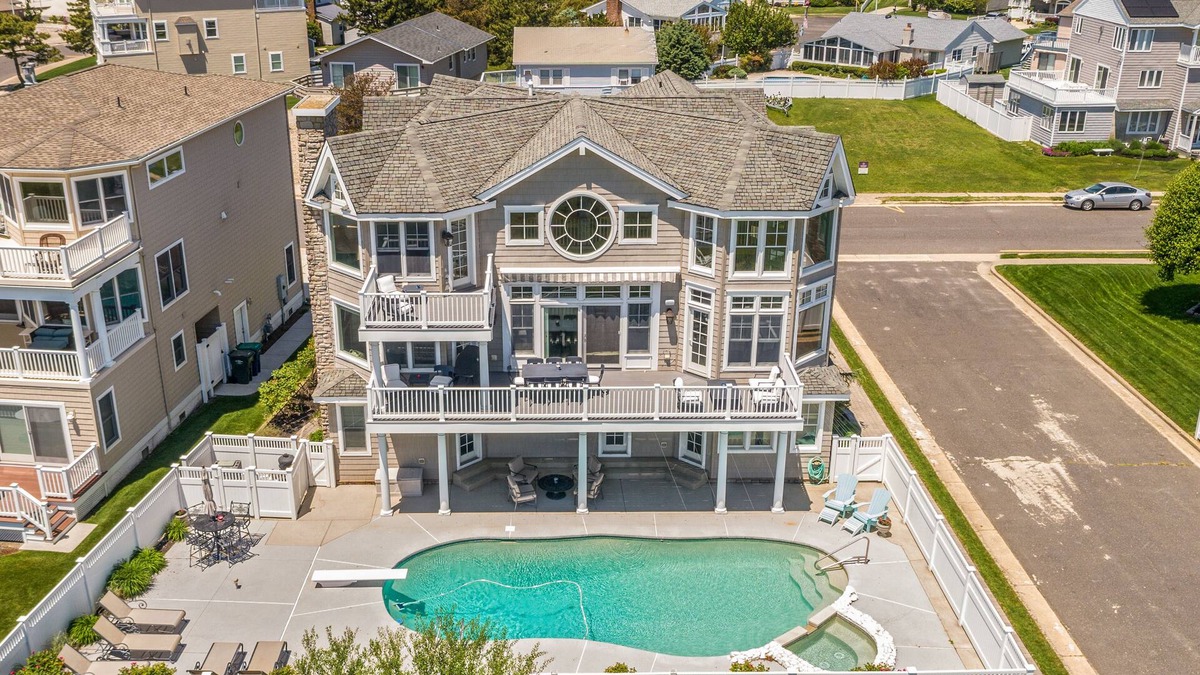 Southend House | Luxury Ocean Front Mansion with Heated Pool, Elevator, Grill and Suites Galore