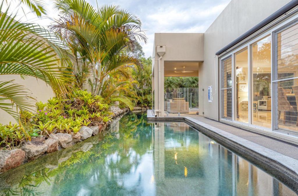 Pelican Waters House | Luxury resort style villa pool by Custom Bnb Hosting