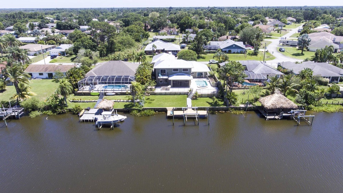 Port Saint Lucie House | Luxury Riverfront Home Pool Dock 20 Min To beach 15 Min to Mets Stadium Pets OK