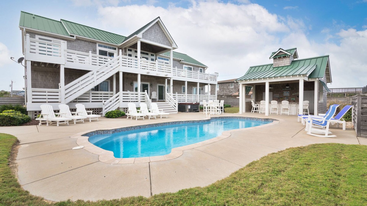 Southern Shores House | Luxury Southern Shores home with Private Pool, Hot Tub with Pool Bar, Game Room, and Theatre Room
