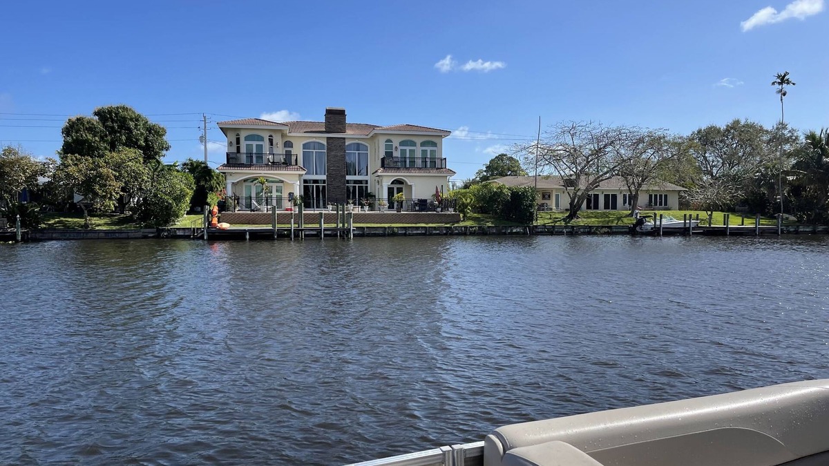 Lake Clarke Shores House | LUXURY WATERFRONT 6BR/5BA HOME - PRIVATE BOAT DOCK/POOL/HOT TUB/HOME THEATER