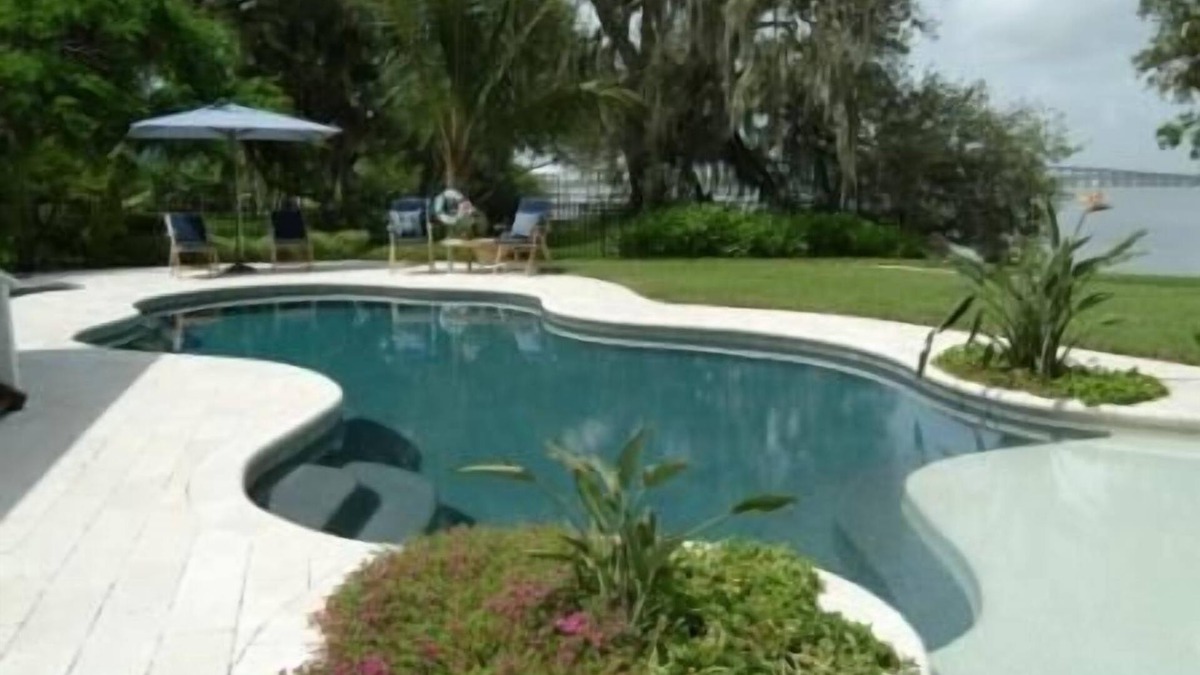 Tropic House | Magical Waterfront Home, Sunsets,Guest House, Beach, Dock, game room, Playground