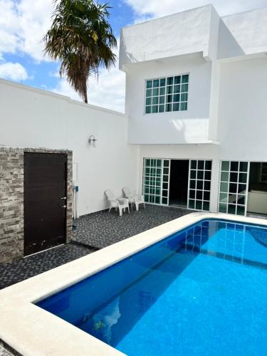S.M. 57 House | Magnífica casa con alberca privada a 10 min del mar