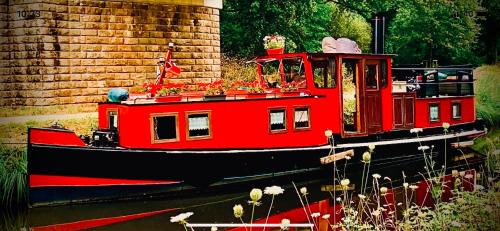 Evran Boat Rental | Magnifique péniche remorqueur à louer