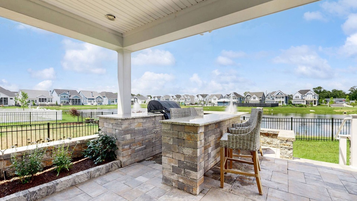 Cedar Neck House | Marlin Chase home with resort amenities, patio, grill, balcony & pool