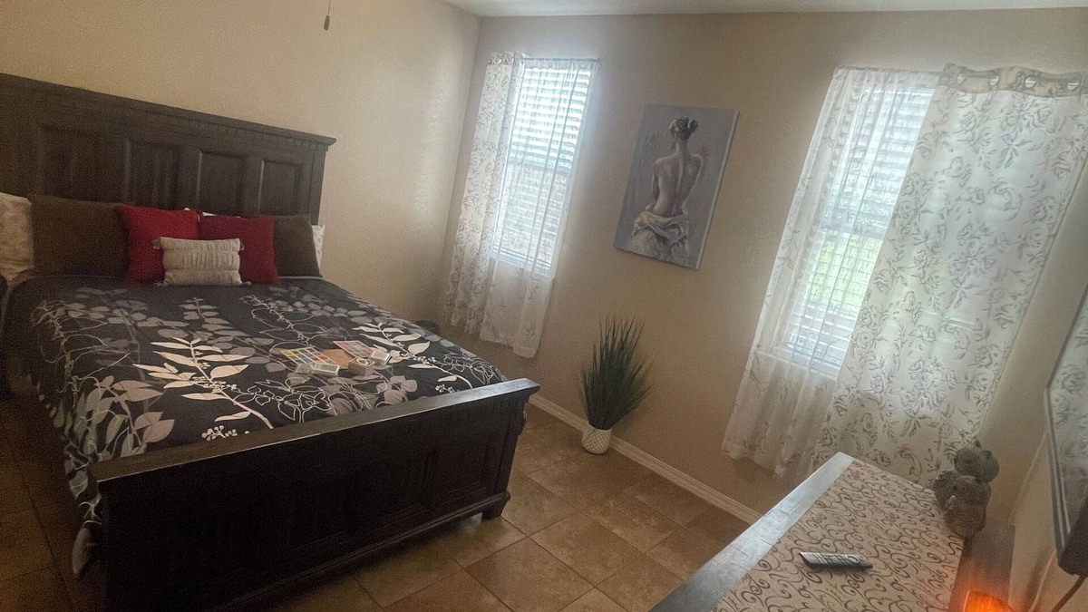 Biggs Field House | Master bedroom with its own full bathroom and walking closet + shared spaces.