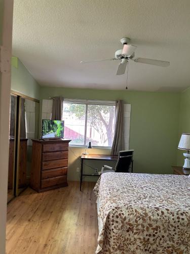 Hemet House | Meadow Harvest Suite with TV and private bathroom