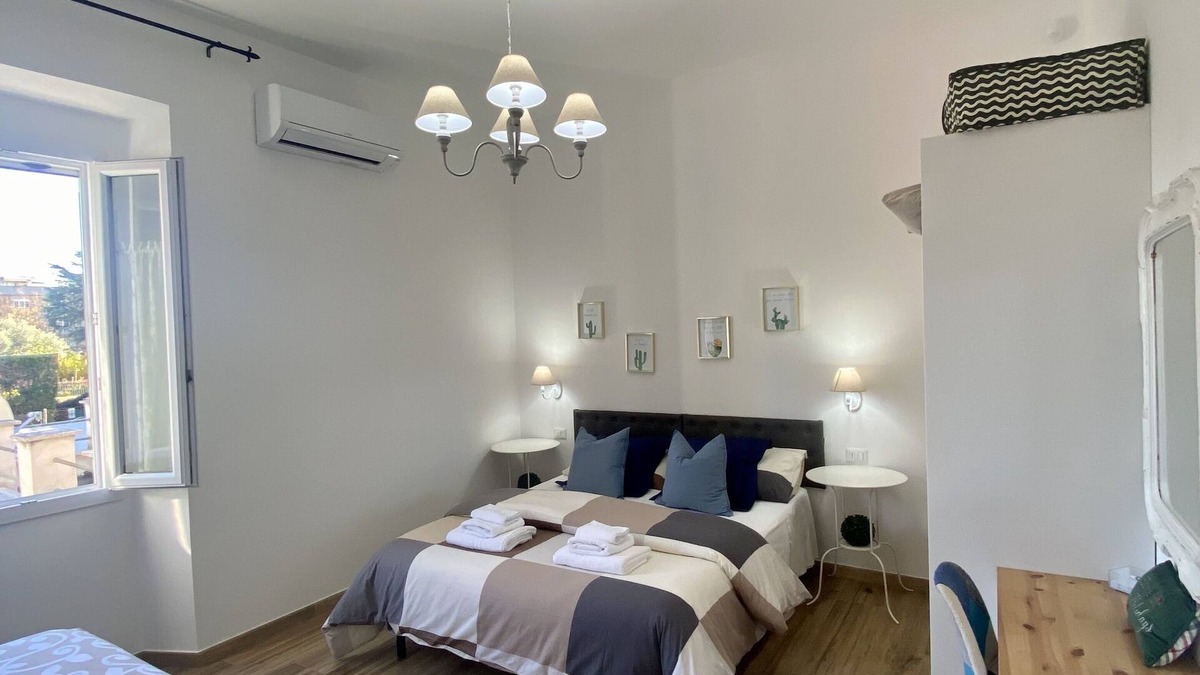 Prenestino-Centocelle Apartment | MenasiHome Your home just a 2-minute walk from the metro stop.