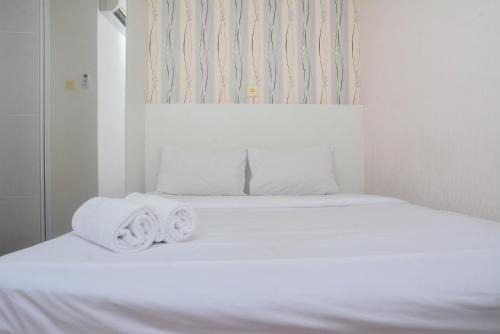 Jatinegara Apartment | Minimalist and Warm 2BR at Bassura City Apartment By Travelio