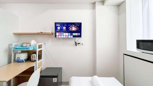 Makassar Apartment | Minimalist Studio (No Kitchen) at Bandaraya - Tallasa City Makassar Apartment By Travelio