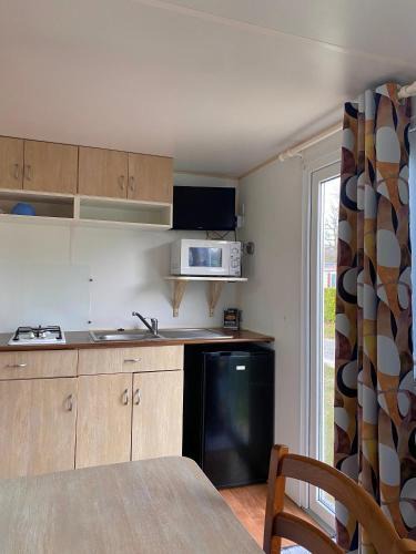 Angicourt Other | Mobil-home mitoyen 1 chambre