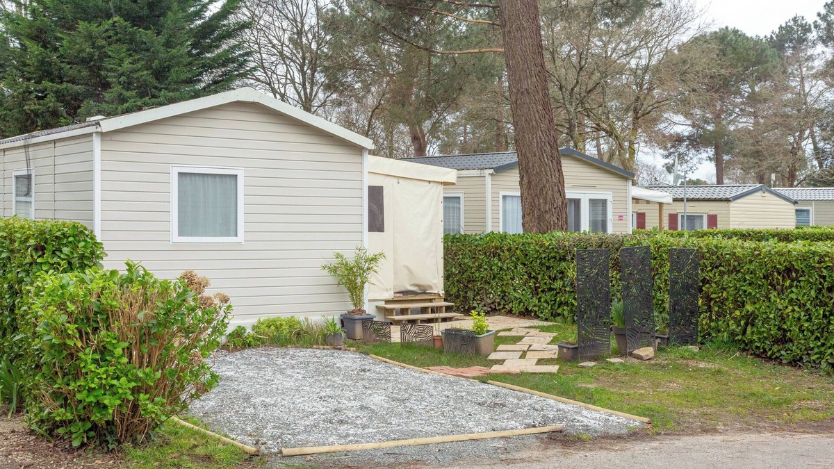Pont-Aven RV Rental | Mobile Home 'Tout Confort Bora Bora' with Shared Pool, Private Terrace and Private Garden