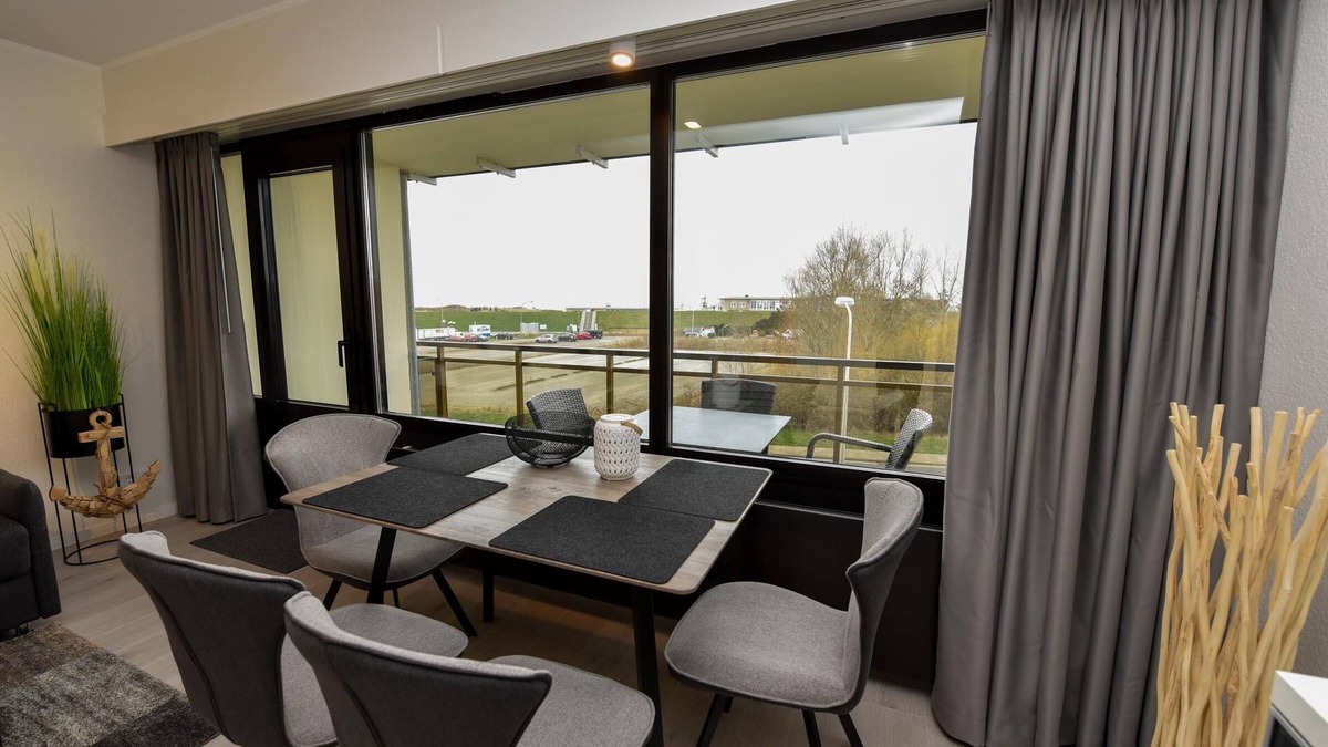 Duhnen Apartment | Modern 1-room lake view apartment on the 2nd floor with balcony