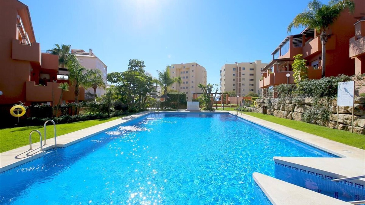 Estepona Apartment | Modern and bright apartment with communal pool, Estepona port near restaurants, bars and beaches