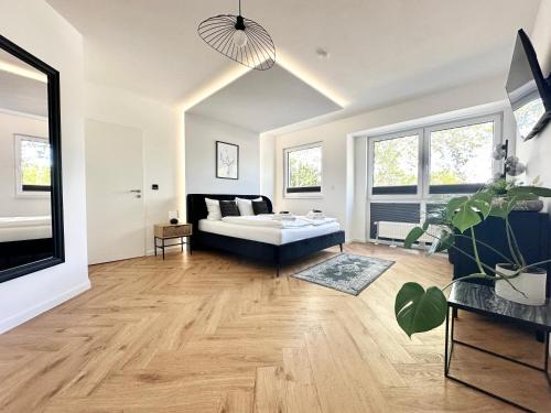 Rauental Apartment | Modern Apartment - für Freunde & Familien, stadtnah, Parkplatz, E-Ladestation, Gitterbox für Fahrräder, Fitnessstudio, digitale Gästemappe mit Restaurant- und Unternehmenstipps