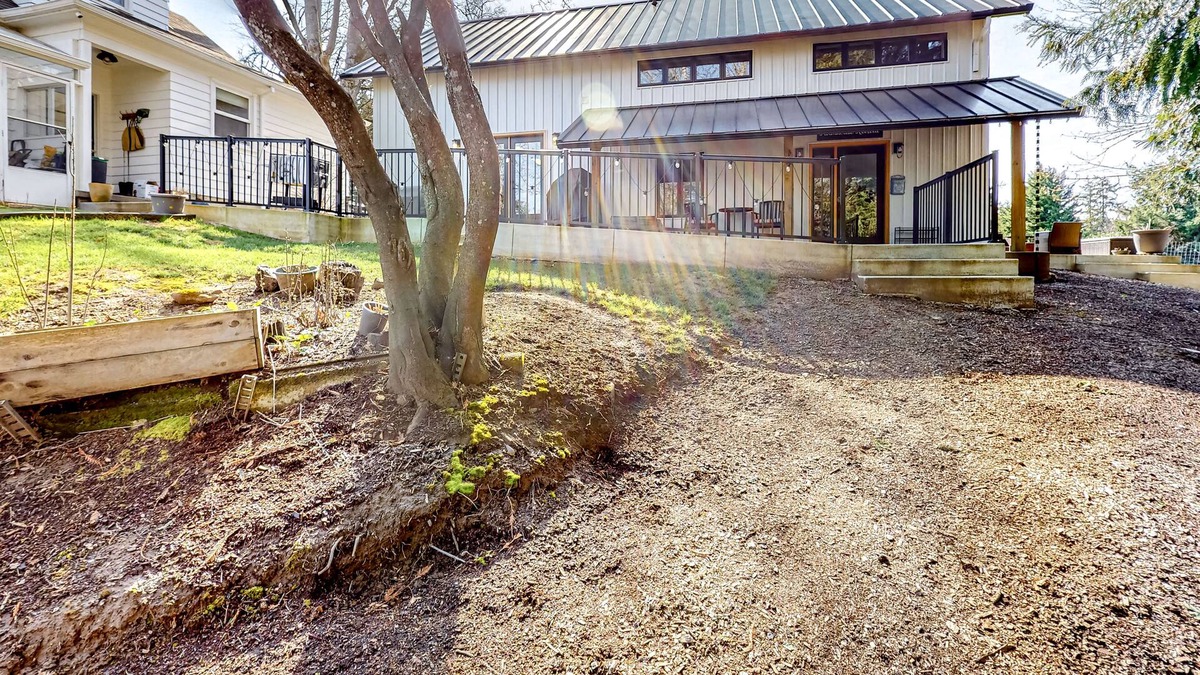Concord Cottage | Modern creekside cottage with patios, yard & great location for exploring