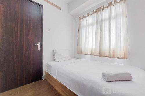 Serpong Apartment | Modern Look and Comfortable 2BR Serpong Greenview Apartment By Travellio