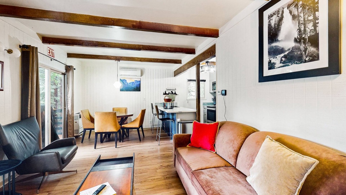 Fish Camp House | Modern lower unit duplex cabin with fireplace, balcony, & EV charger