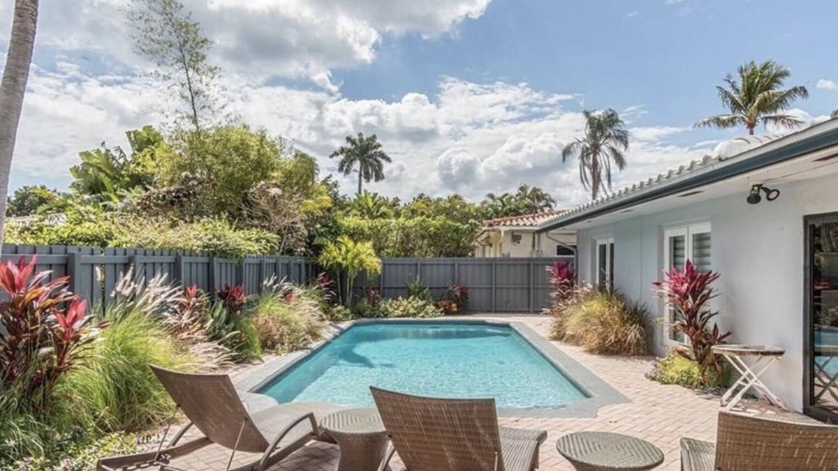 Dolphin Isles House | MODERN LUXURY: 4 Bedroom Heated Pool Home! Walk to beach & Restaurants!