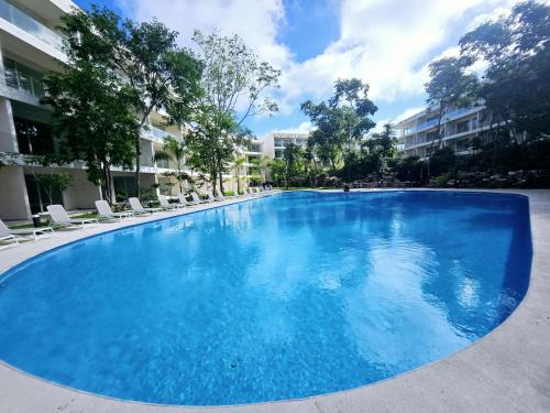Playacar Apartment | Modern Playacar Condo with Poolside Views & Nature