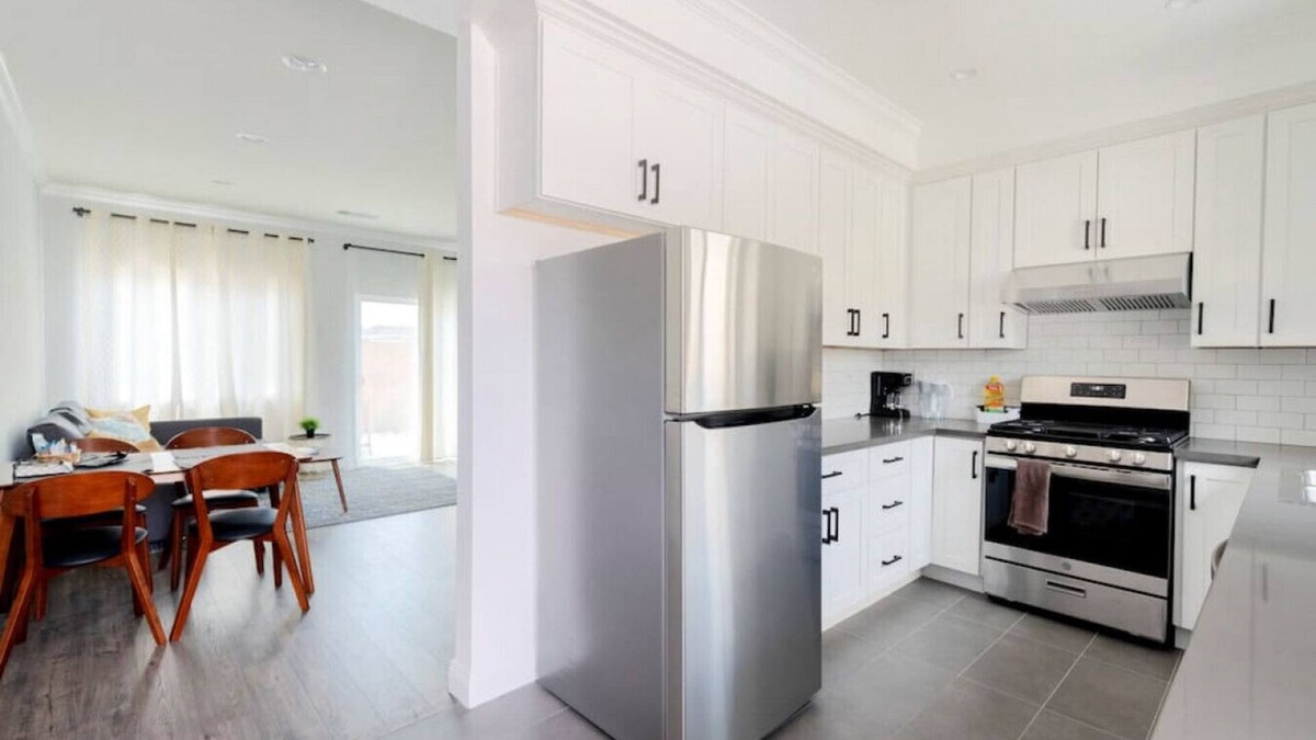 Azusa House | Modern Space Hideaway : w/2 King Beds, 2 Baths, Full Kitchen, a Pull-Out Sofa, with Backyard Patio and Gated Parking.
