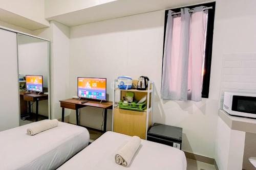 Makassar Apartment | Modern Studio (No Kitchen) at Bandaraya - Tallasa City Makassar Apartment By Travelio