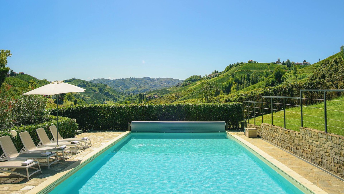 San Bovo Villa | Modern villa with private pool and panoramic vineyard views in Piemonte.
