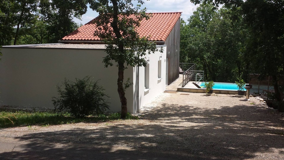 Luzech House | Modern wooden house with tree terrace and private heated pool