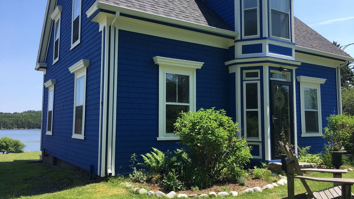 Lunenburg County House | Modernized waterfront heritage homestead with entertainment barn