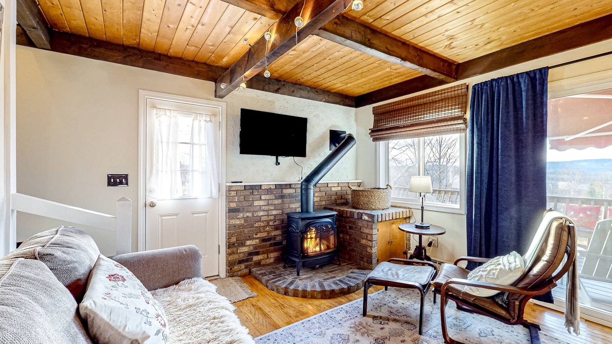 Whitefield House | Mountain-view cottage with inviting deck, fireplace & washer/dryer
