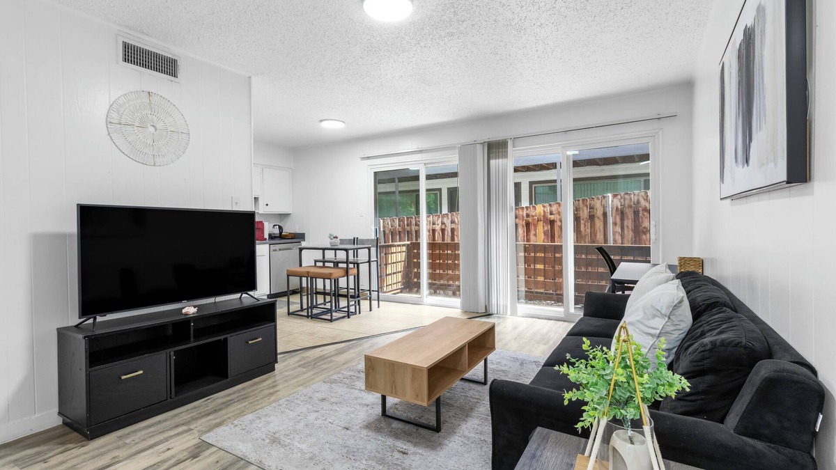 West Campus Apartment | Near UTA~Free Parking~Smart TVs~Stocked Kitchen